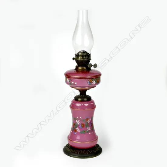 A Victorian pink glass and brass kerosene banqueting lamp