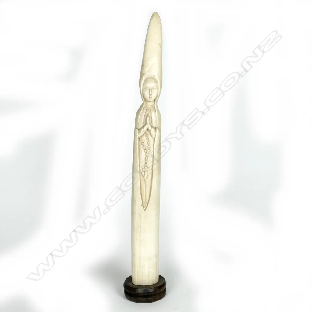 A tall slender African ivory tusk Image 1++