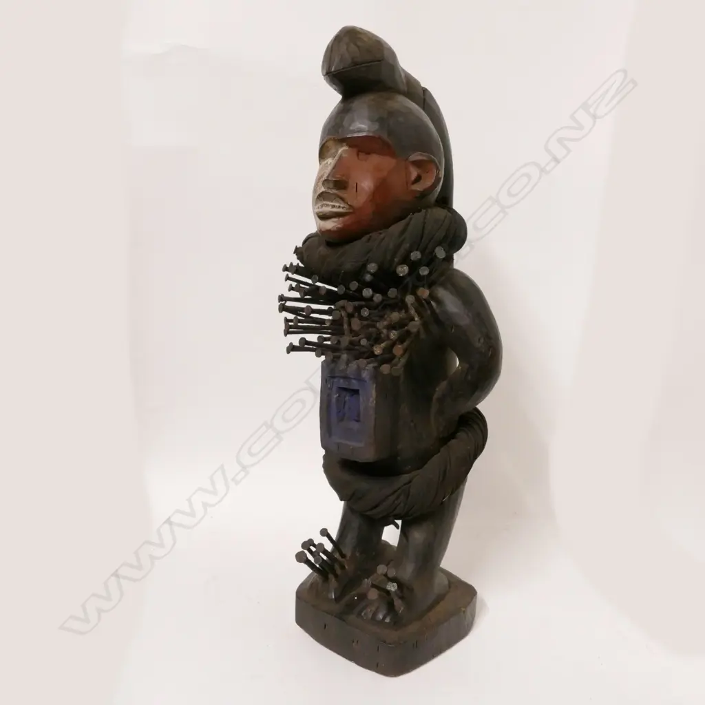 An African carved wood fetish figure Image 1++