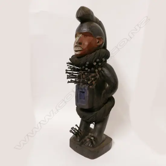 An African carved wood fetish figure