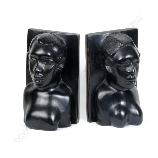 A pair of old African ebony bookends
