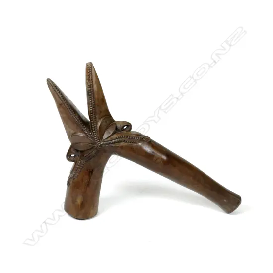 A large heavy Vanuatuan ceremonial pig killer