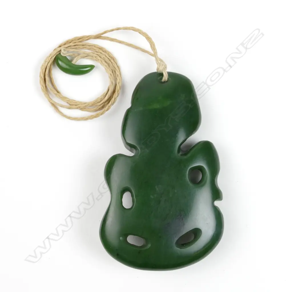 A modern Maori pounamu hei tiki Image 1++