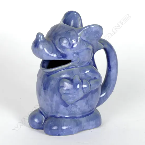 A Crown Lynn trickle glaze Mickey Mouse jug