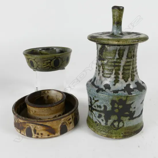 A Betty de Lange lidded jar and two candle stands