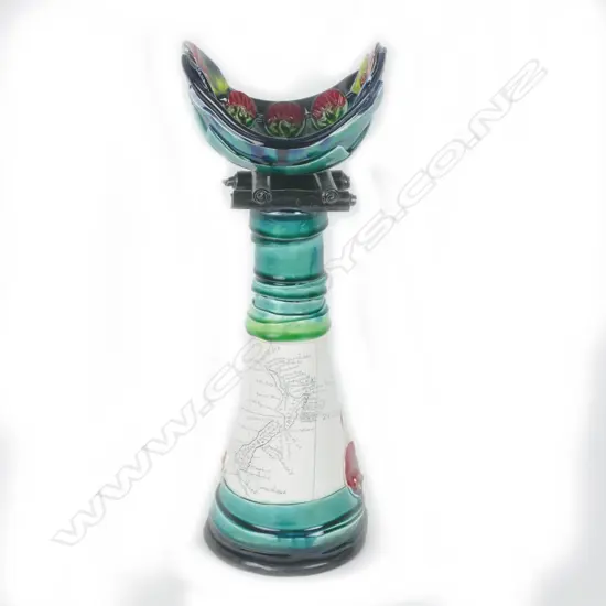 A Katie Gold large Captain Cook standing boat vessel