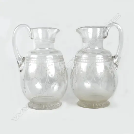 Two Stuart etched crystal jugs