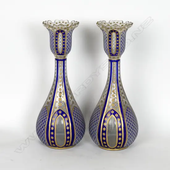 A pair of antique Bohemian flashed glass vases