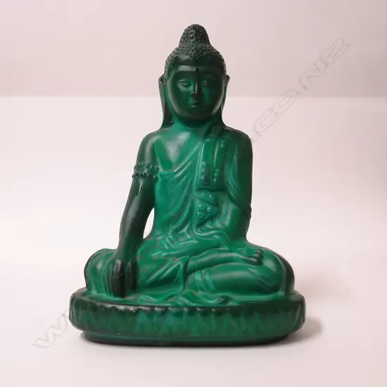 An Art Deco heavy malachite glass Buddha