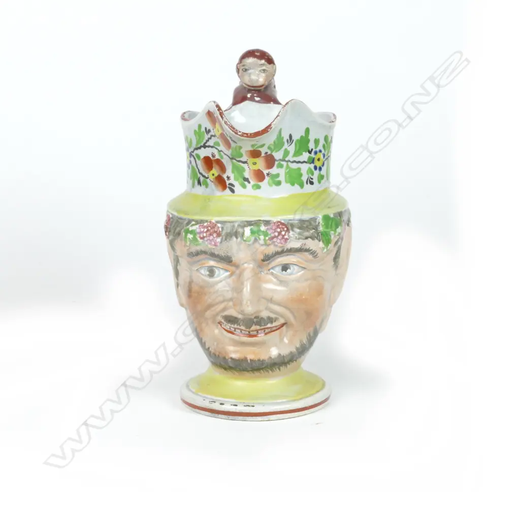 An early 19thC Prattware mask jug Image 1++