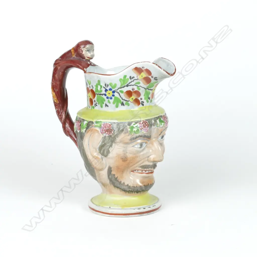 An early 19thC Prattware mask jug Image 1++