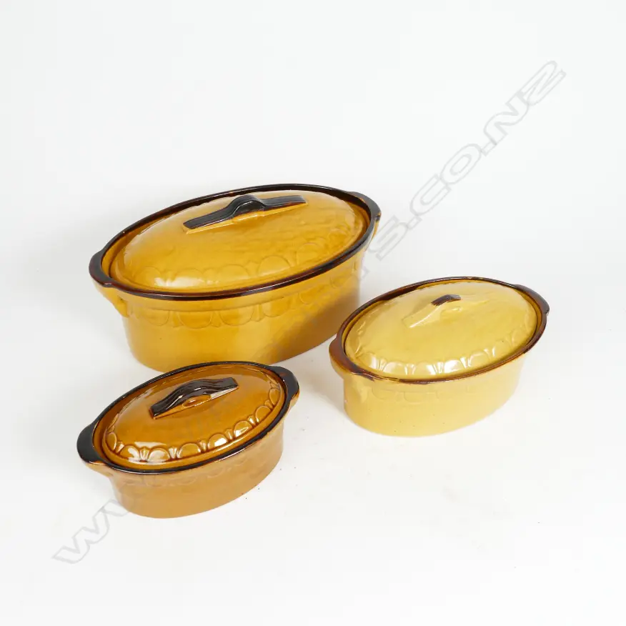 A graduated set of three vintage French lidded casserole pots Image 1++