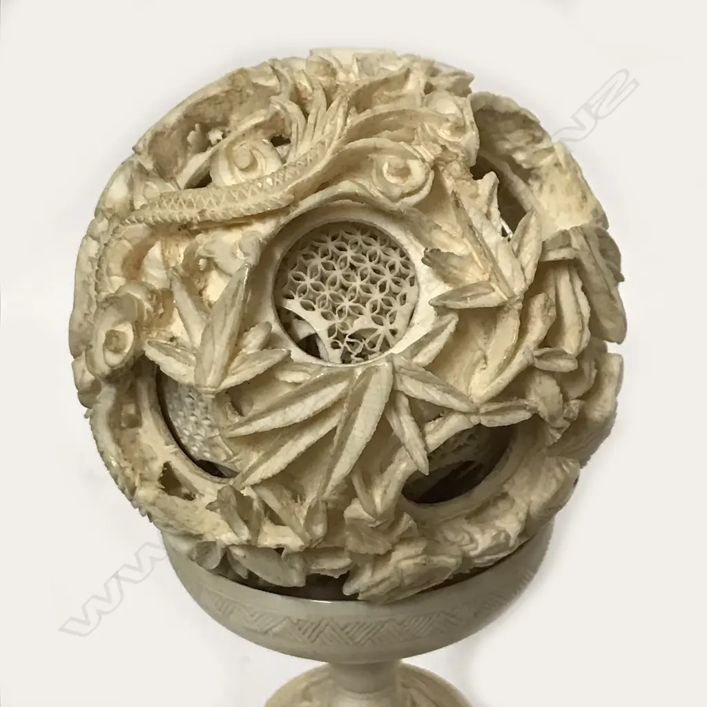An old Chinese ivory puzzle ball of ten concentric layers Image 1++