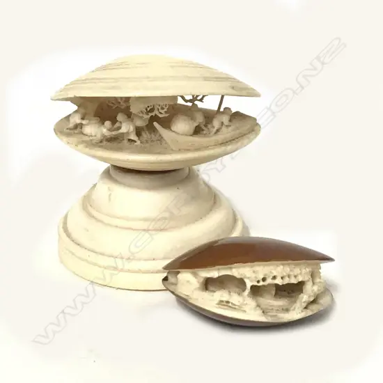 Two carved ivory 'dream shells'