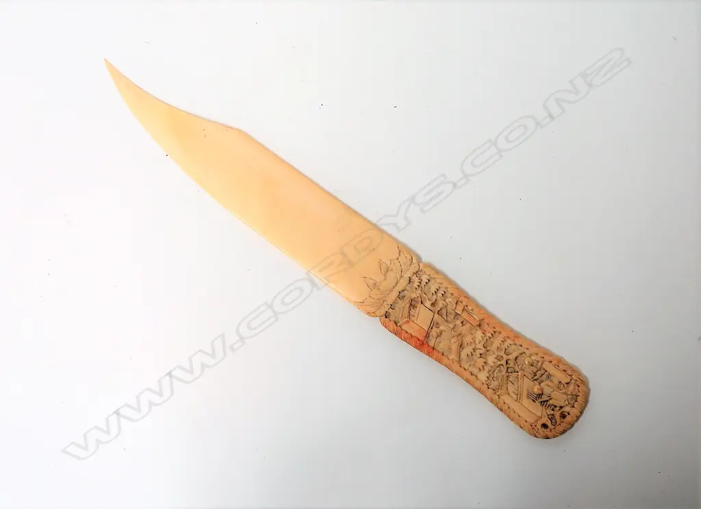A 19thC Chinese finely carved paper knife Image 1++