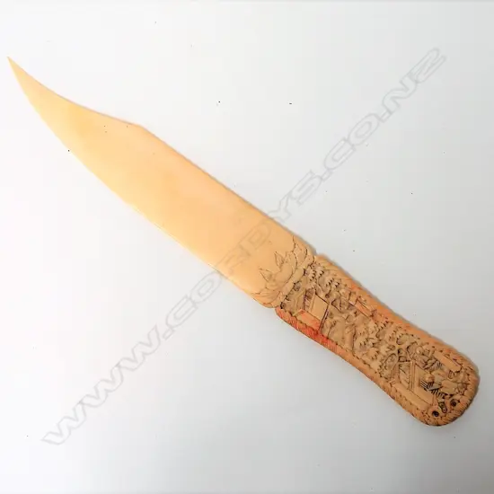 A 19thC Chinese finely carved paper knife
