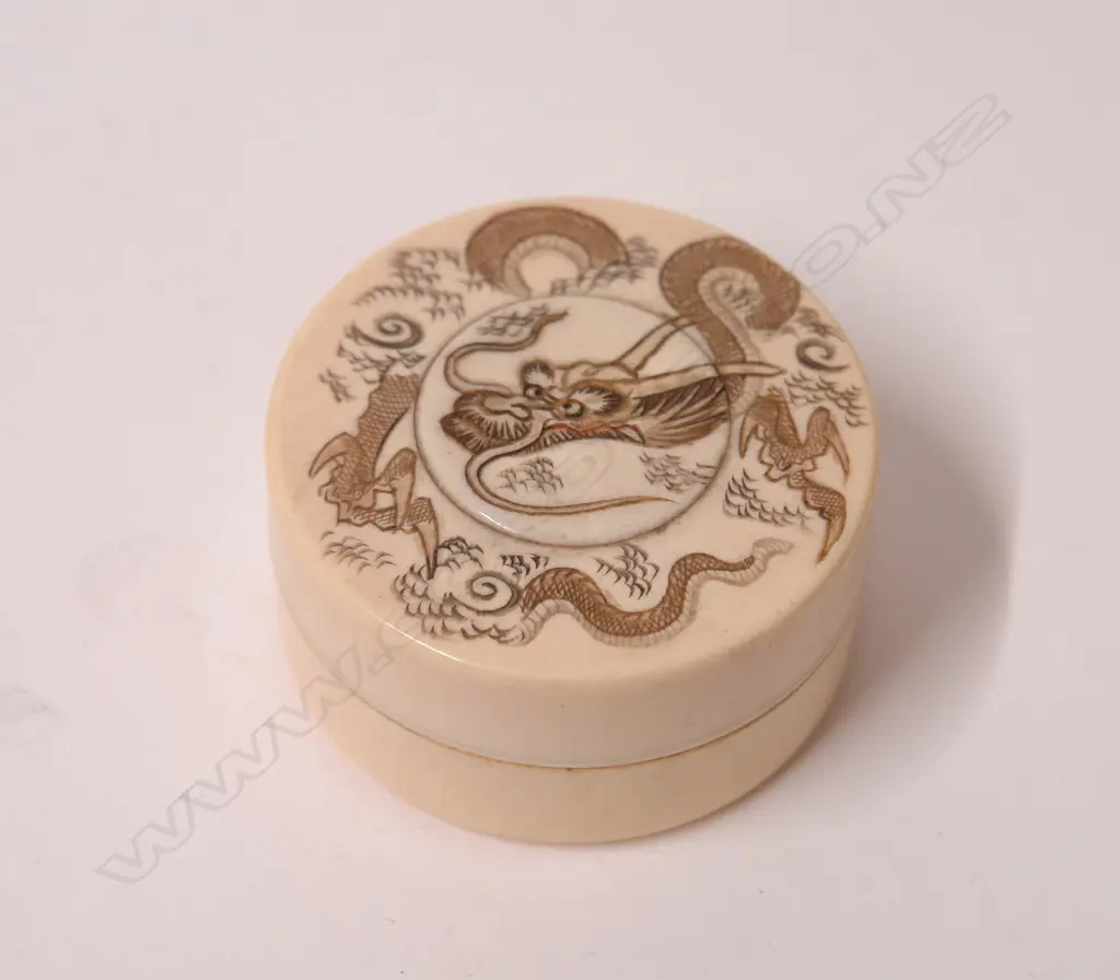 An old Chinese carved ivory circular lidded container Image 1++