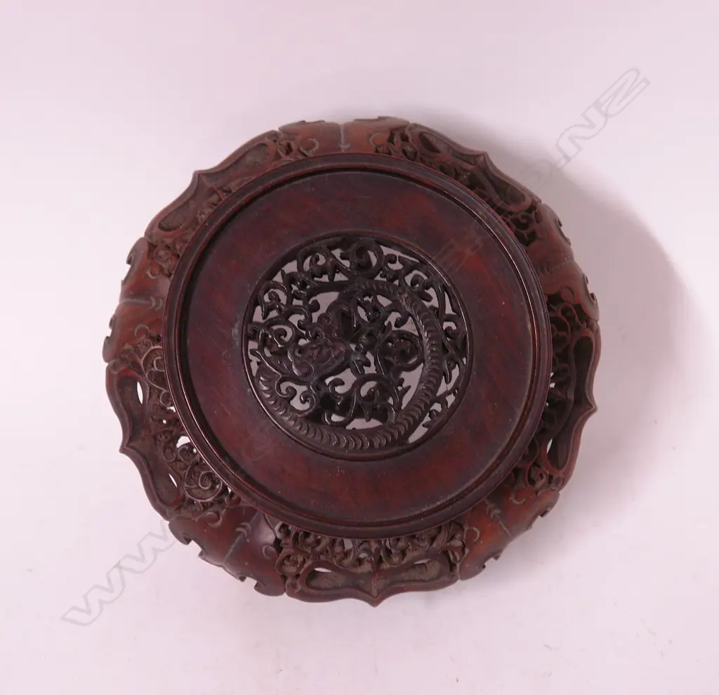 A finely carved hardwood vase stand Image 1++