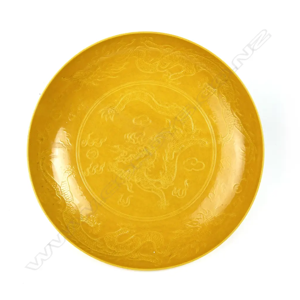 A Chinese porcelain Imperial yellow shallow bowl Image 1++