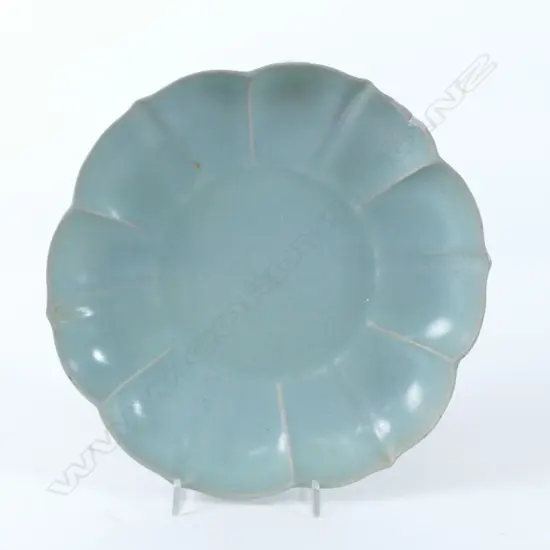 A Japanese celadon glazed plate