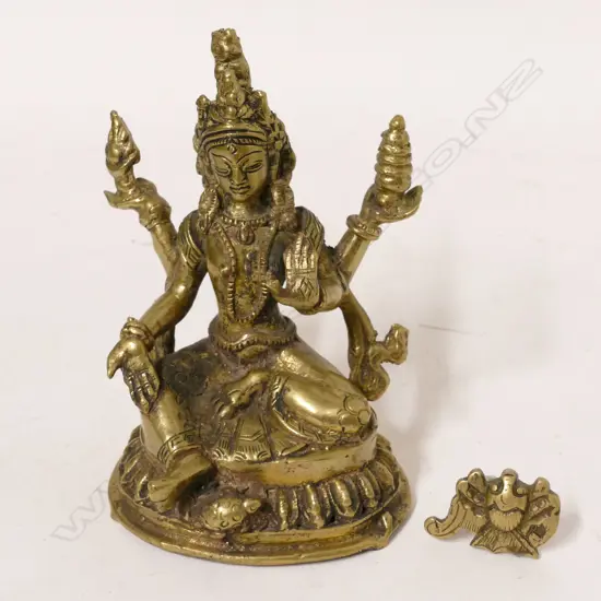 A polished bronze bodhisattva