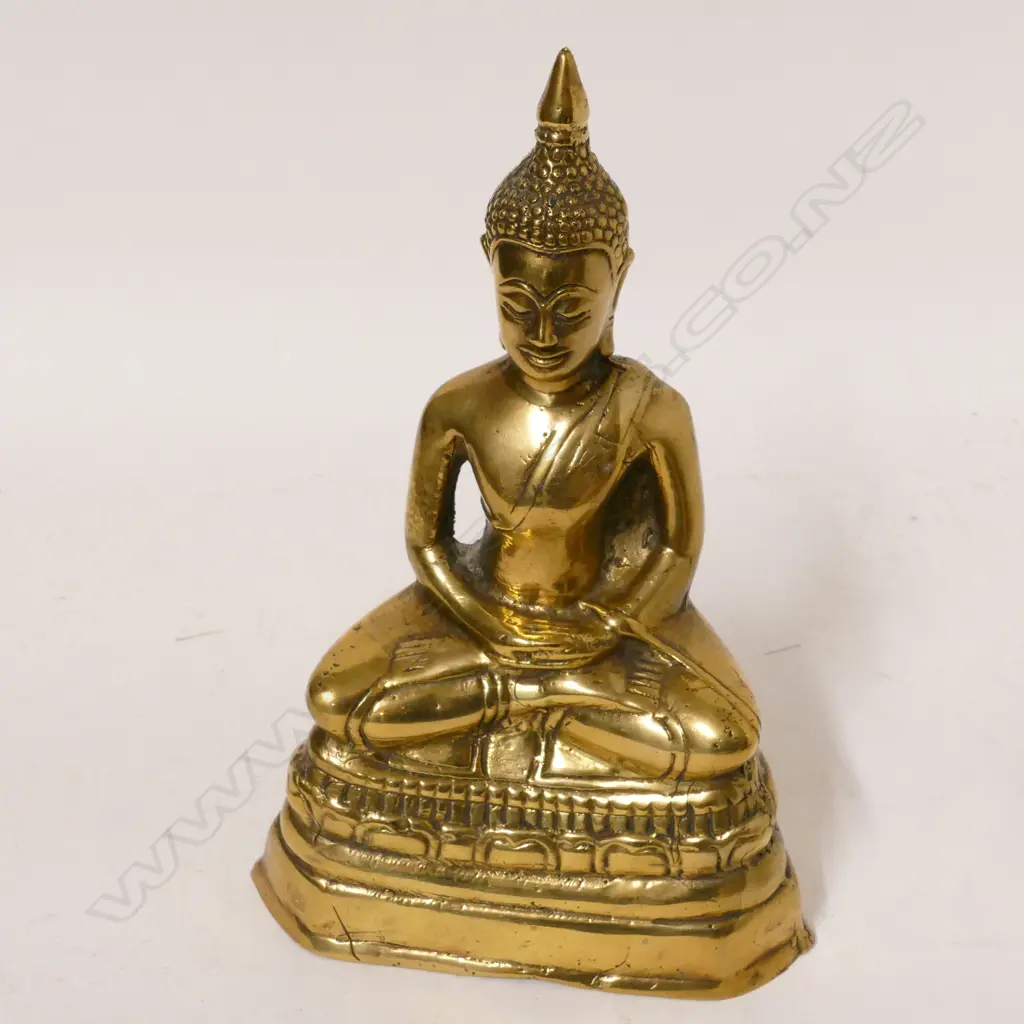 A Tibetan polished bronze Buddha Image 1++