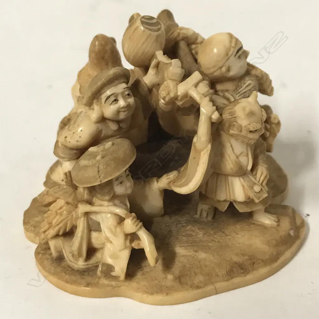 A fine Japanese Meiji period small okimono group Image 1++