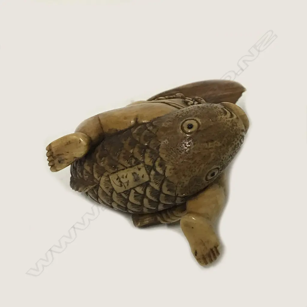 A small ivory okimono Image 1++