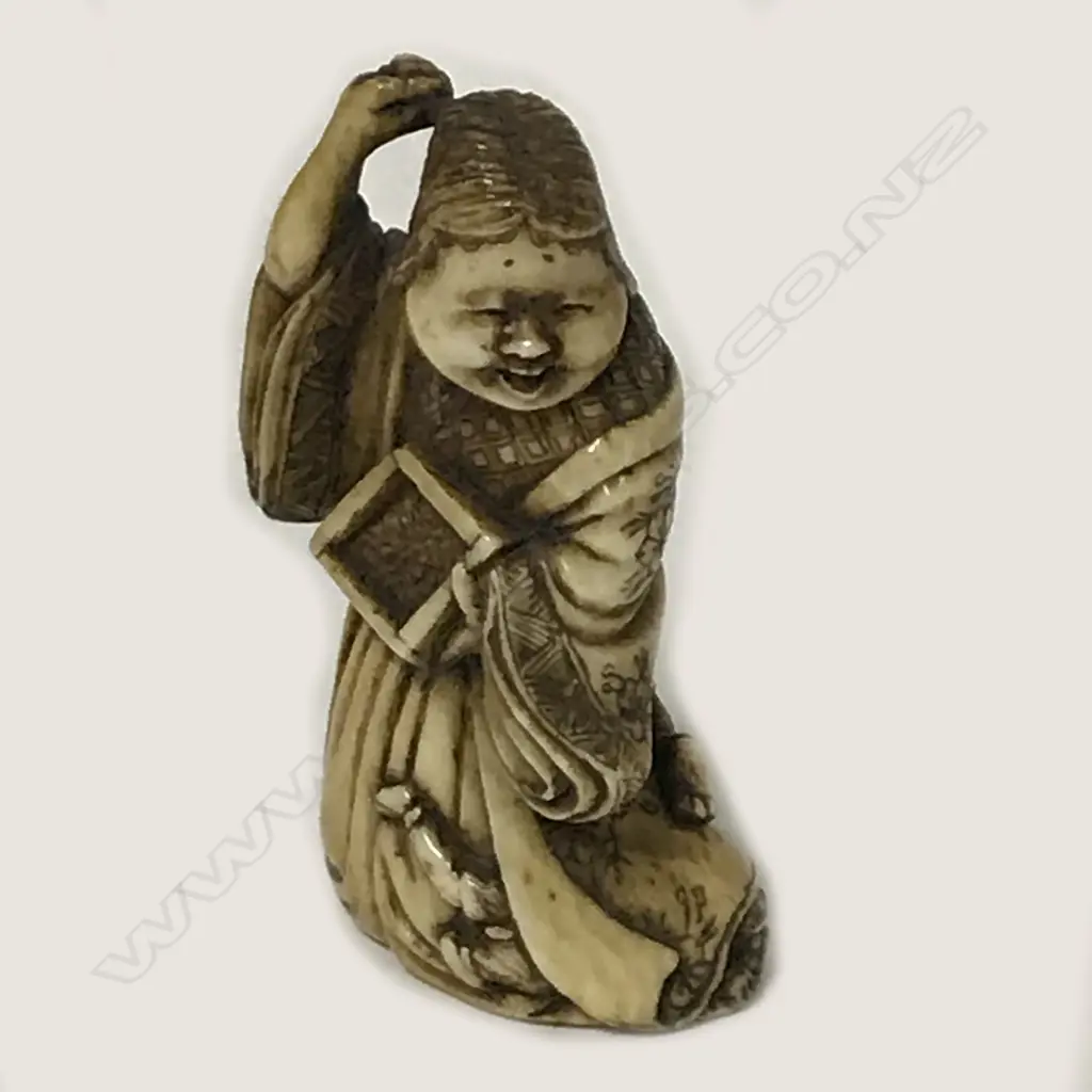 An early 19thC ivory netsuke Image 1++