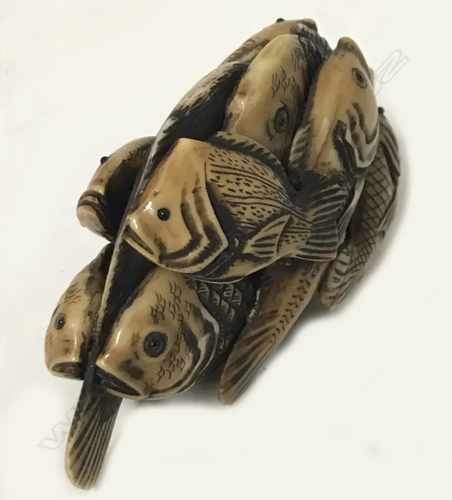 An old compactly carved ivory okimono Image 1++