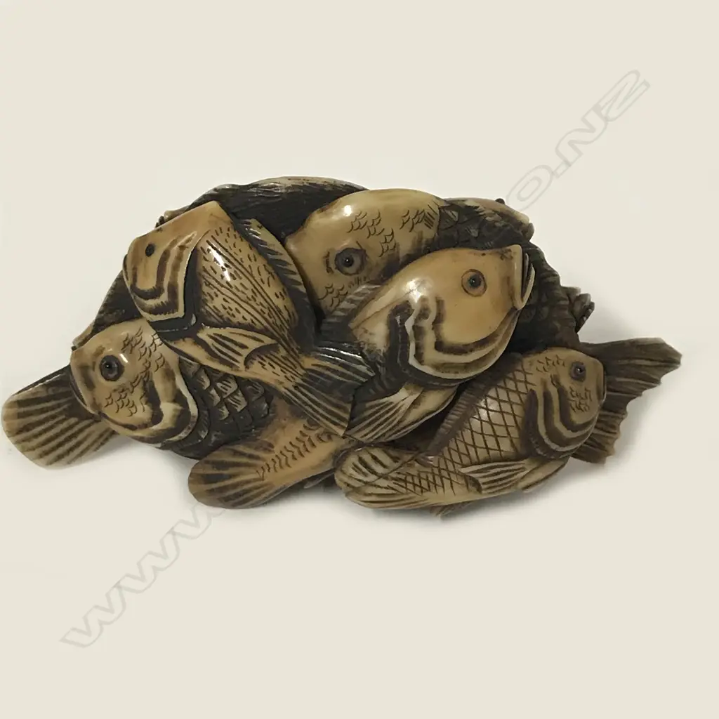 An old compactly carved ivory okimono Image 1++