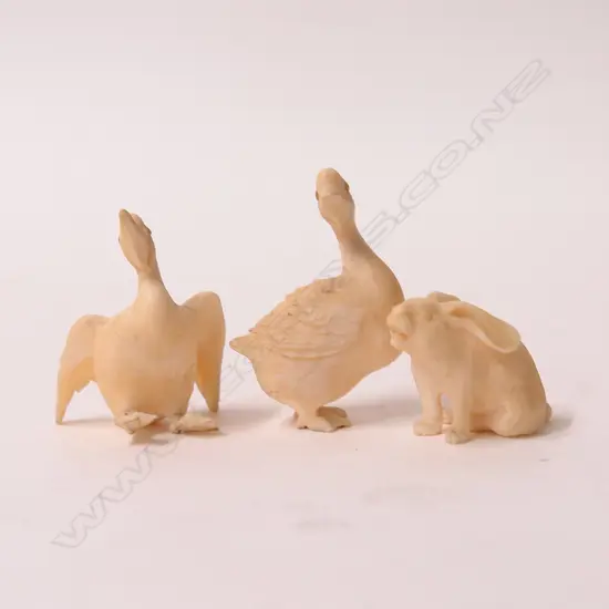 Three finely carved ivory small figures