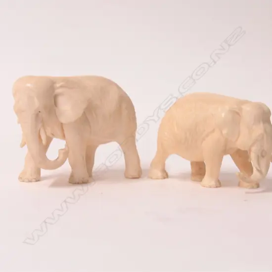 Two early 20thC carved ivory elephants