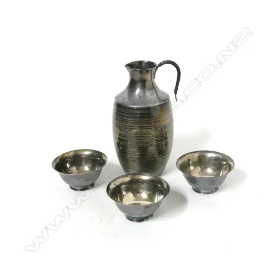 A vintage Japanese silver Wako Co. Ltd Ginza small jug and cup set