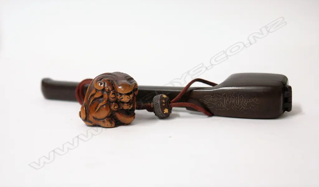 A 19thC Japanese bronze travelling pen and ink receptacle with attached 19thC carved boxwood shishi netsuke Image 1++