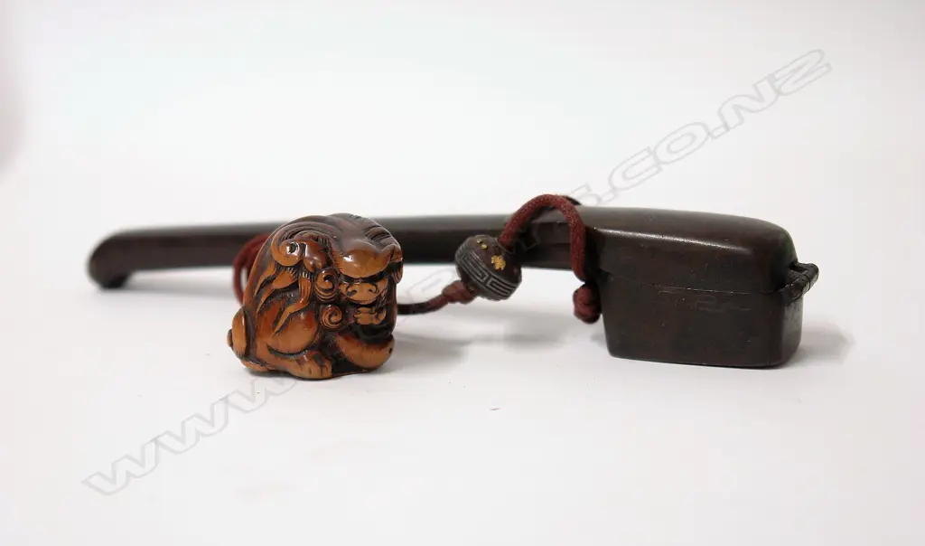 A 19thC Japanese bronze travelling pen and ink receptacle with attached 19thC carved boxwood shishi netsuke Image 1++