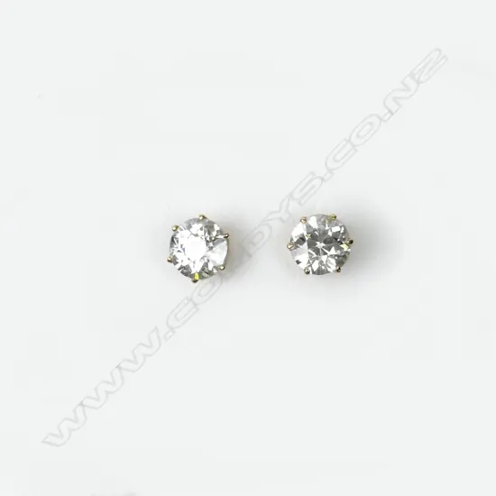 A pair of diamond stud earrings