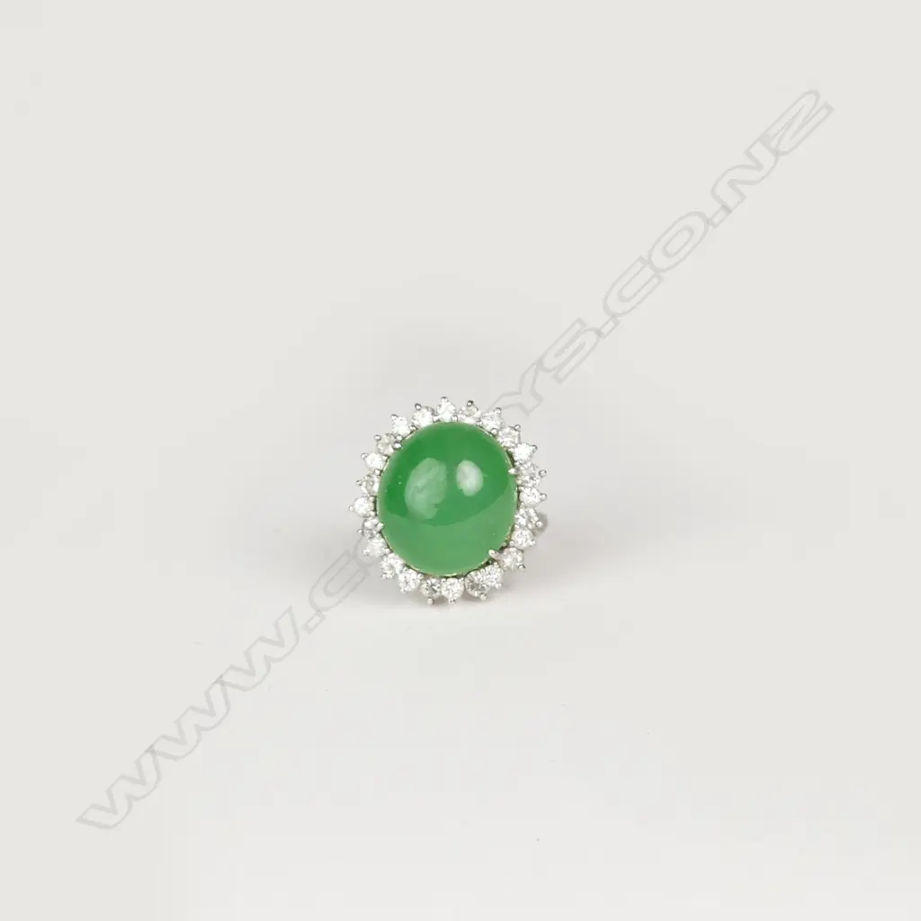 A platinum jade and diamond ring Image 1++
