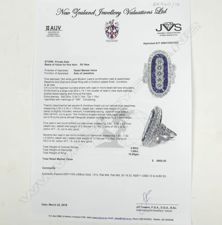 An 18ct. white gold sapphire and diamond dress ring Image 1++