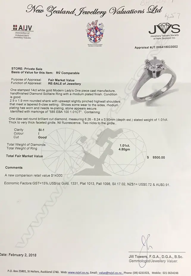 A 14ct. white gold and diamond solitaire ring Image 1++