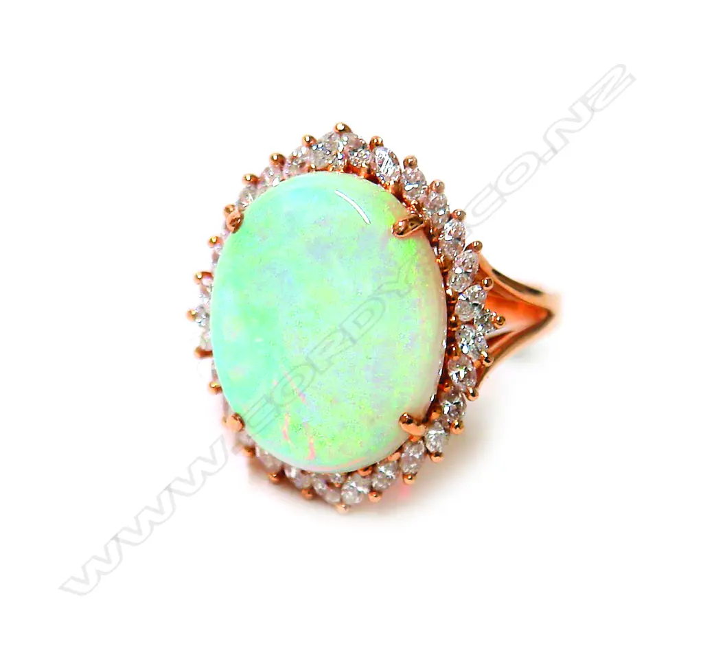 An impressive large 18ct. rose gold opal and diamond ring Image 1++