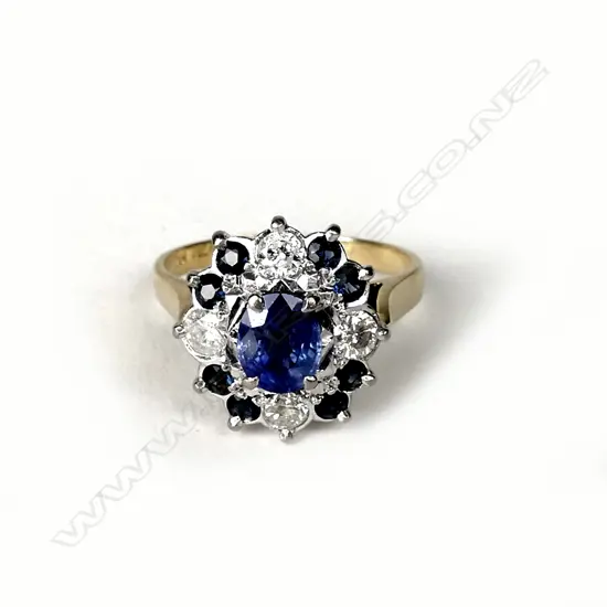 An 18ct gold diamond and sapphire ring