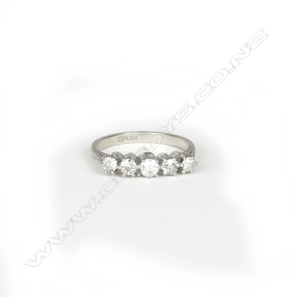 An estate platinum and five stone diamond ring Image 1++