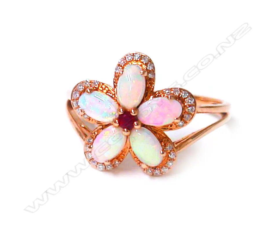 An 18ct. rose gold opal ruby and diamond ring Image 1++