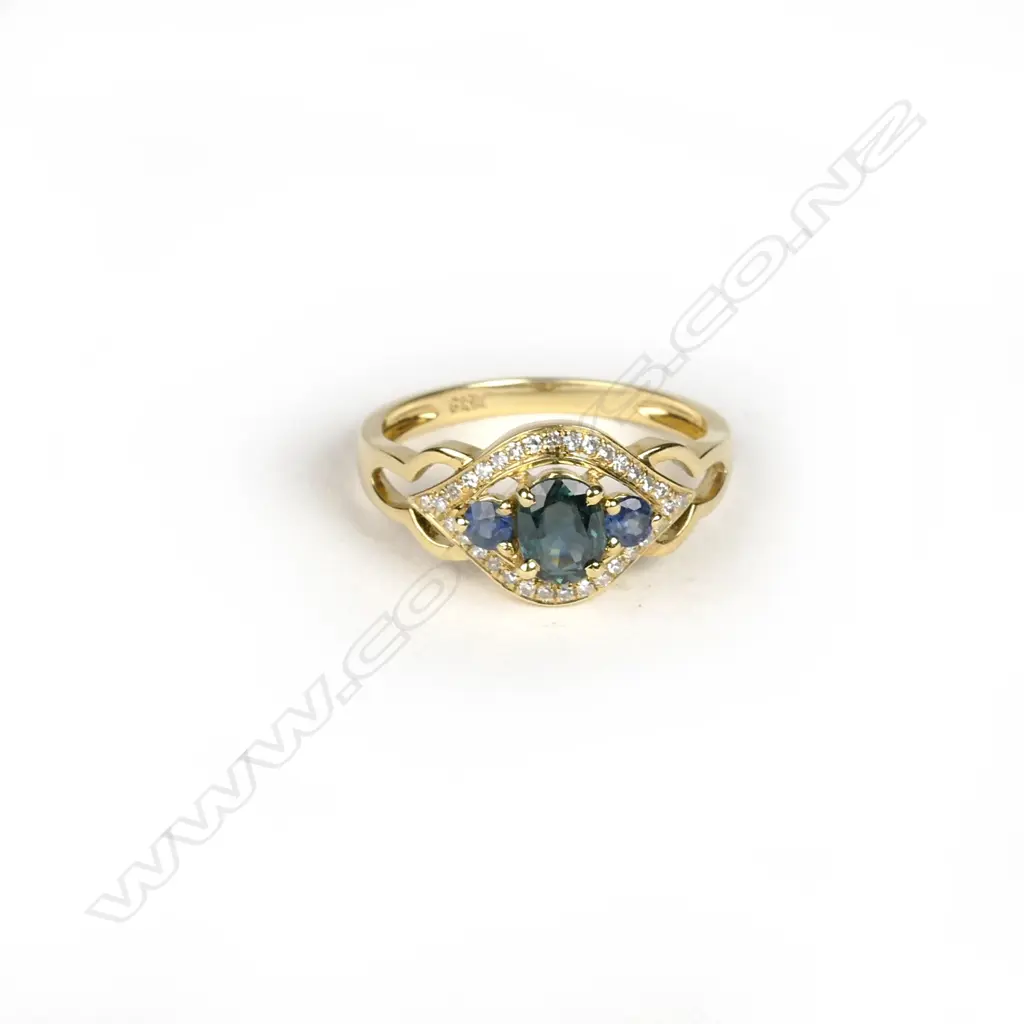 An 18ct. yellow gold sapphire and diamond ring Image 1++