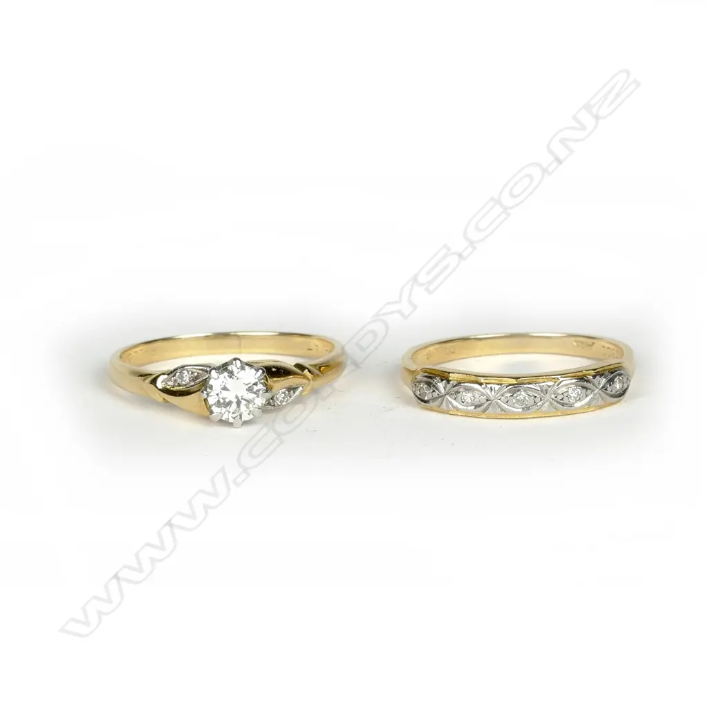 An 18ct. gold and diamond ring set Image 1++