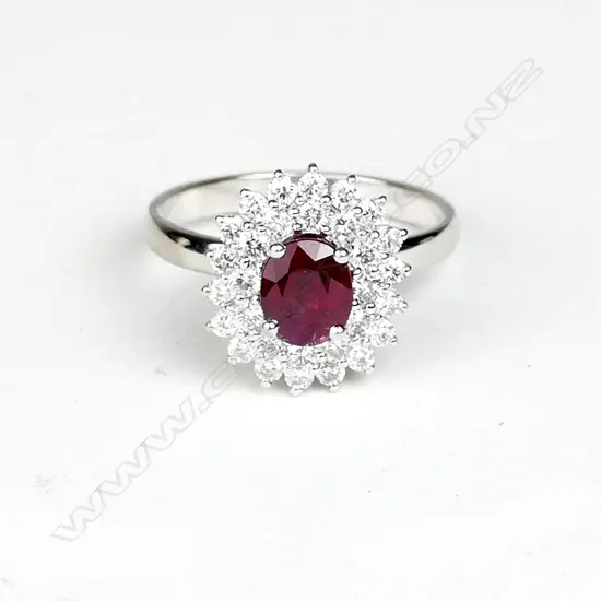 An 18ct. white gold ruby and diamond ring