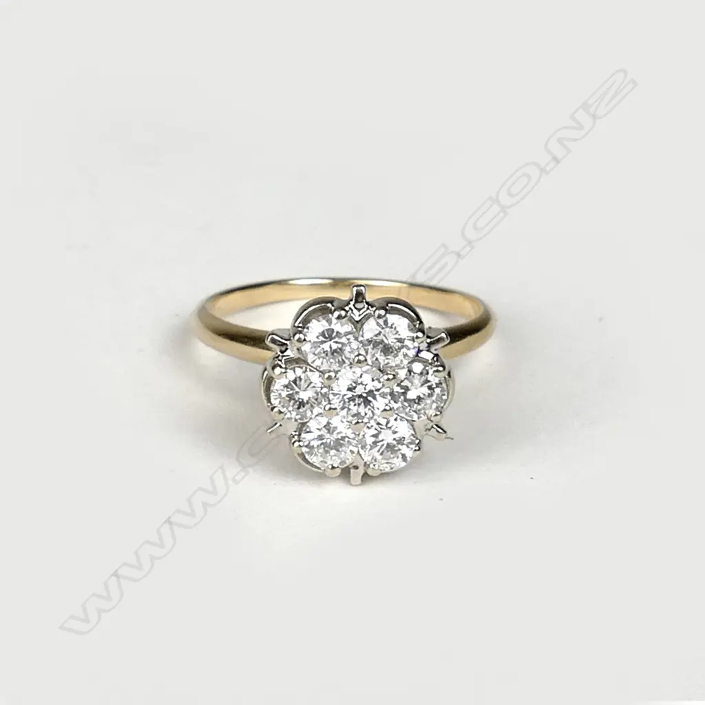 A 14ct. gold and diamond cluster ring Image 1++