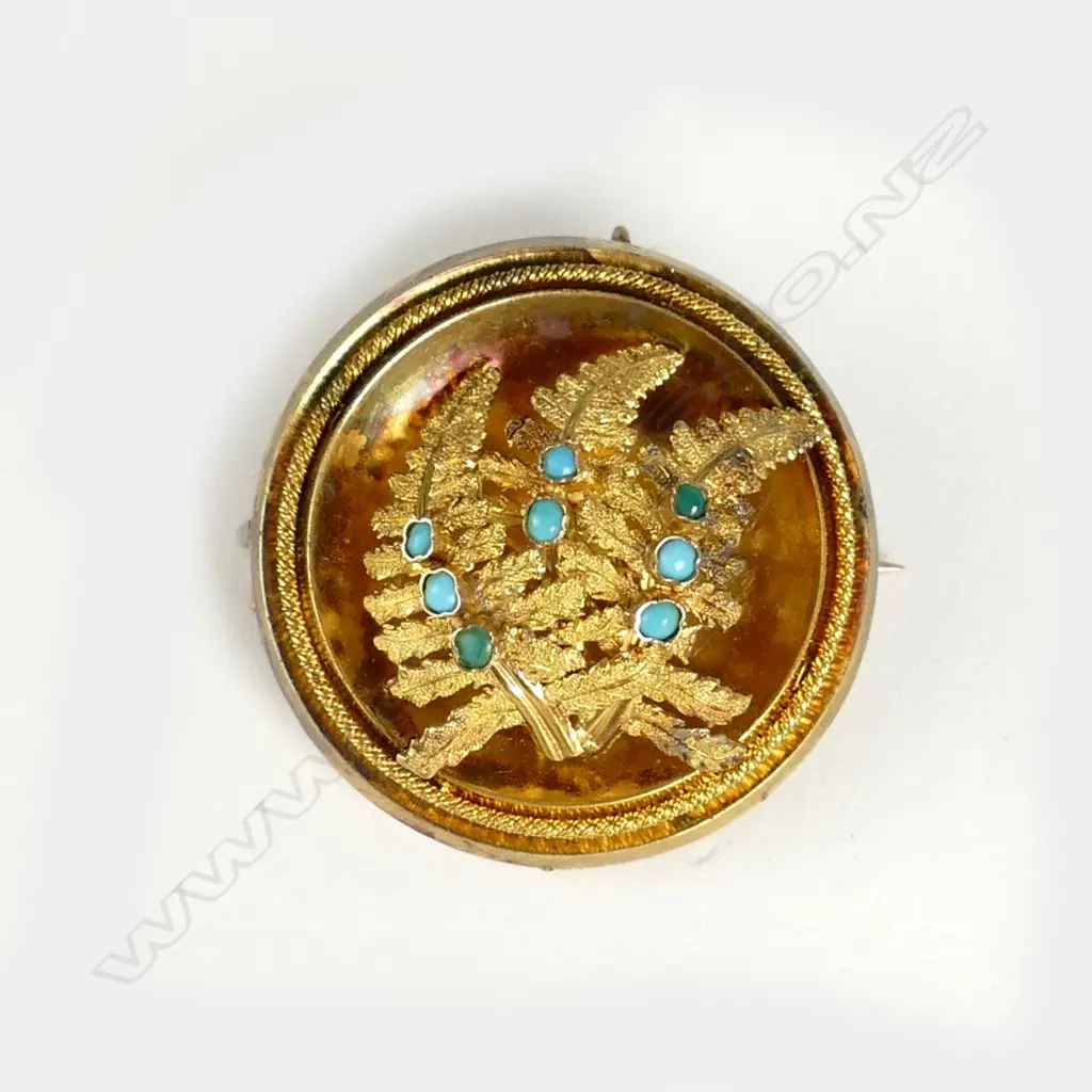 A Victorian gilded 18ct. yellow gold and turquoise fern leaf brooch Image 1++