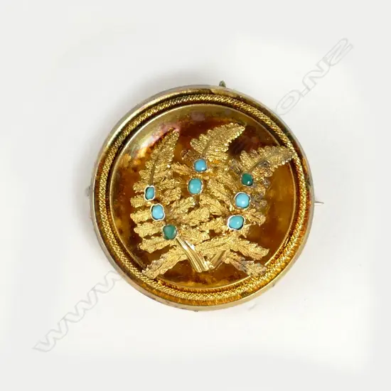 A Victorian gilded 18ct. yellow gold and turquoise fern leaf brooch